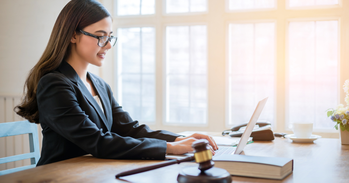 legal nurse consulting at her desk with laptop